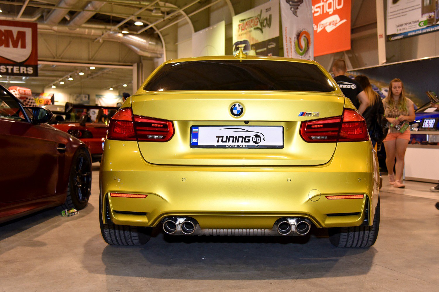 Rear view with quad exhaust and bold taillights