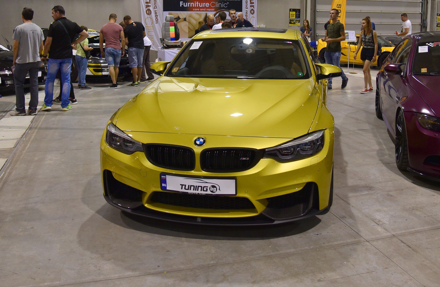 Aggressive front grille and LED headlights of a sports sedan