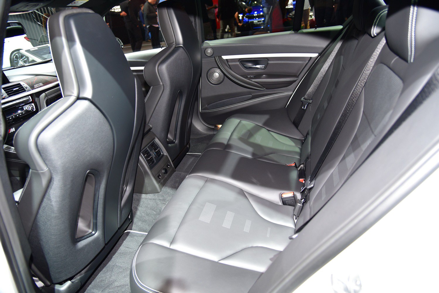 Black leather rear seating with door panel speaker