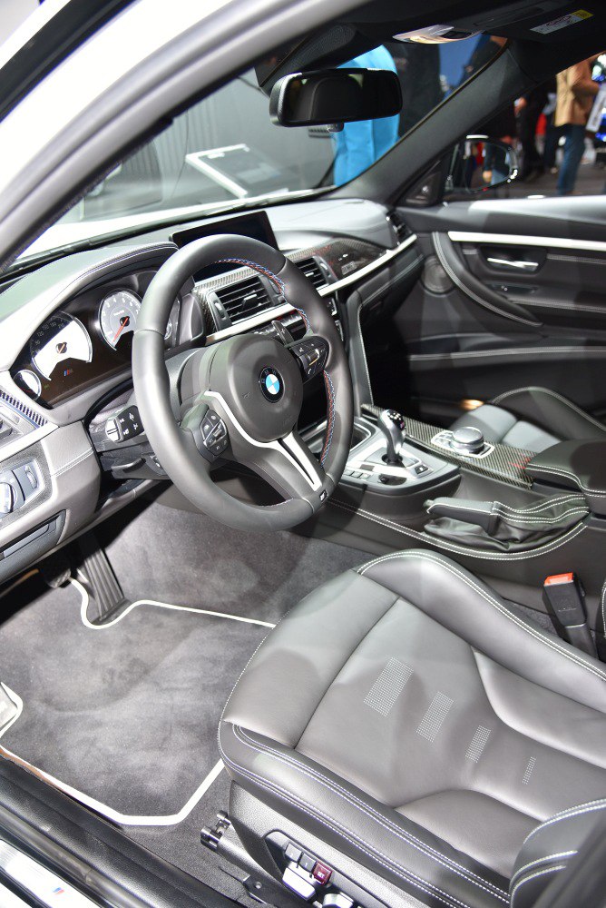 Interior with steering wheel, dashboard, leather seats
