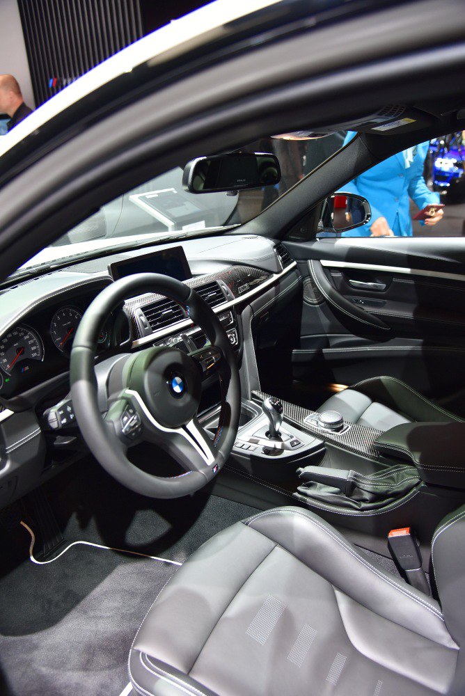 Luxury sports steering wheel and dashboard with carbon fiber trim