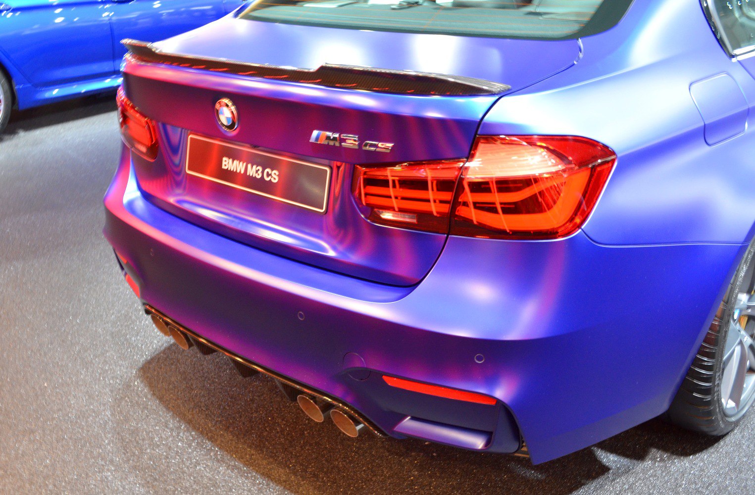 Rear of a BMW M3 CS with quad exhaust and sporty tail lights