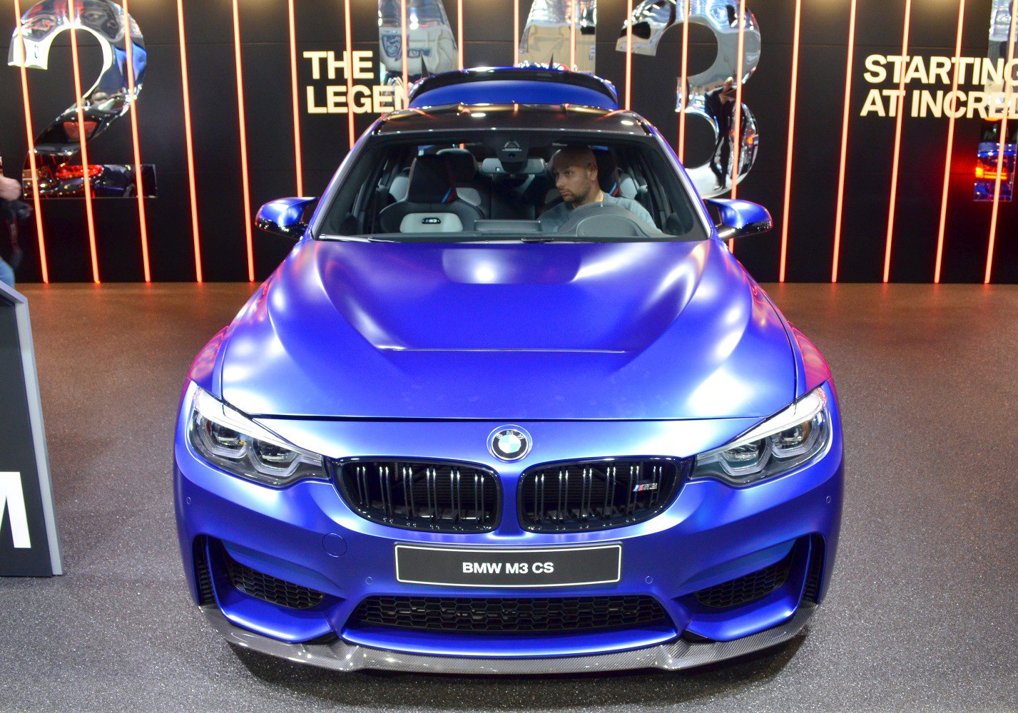 Front view showing aggressive grille and LED headlights
