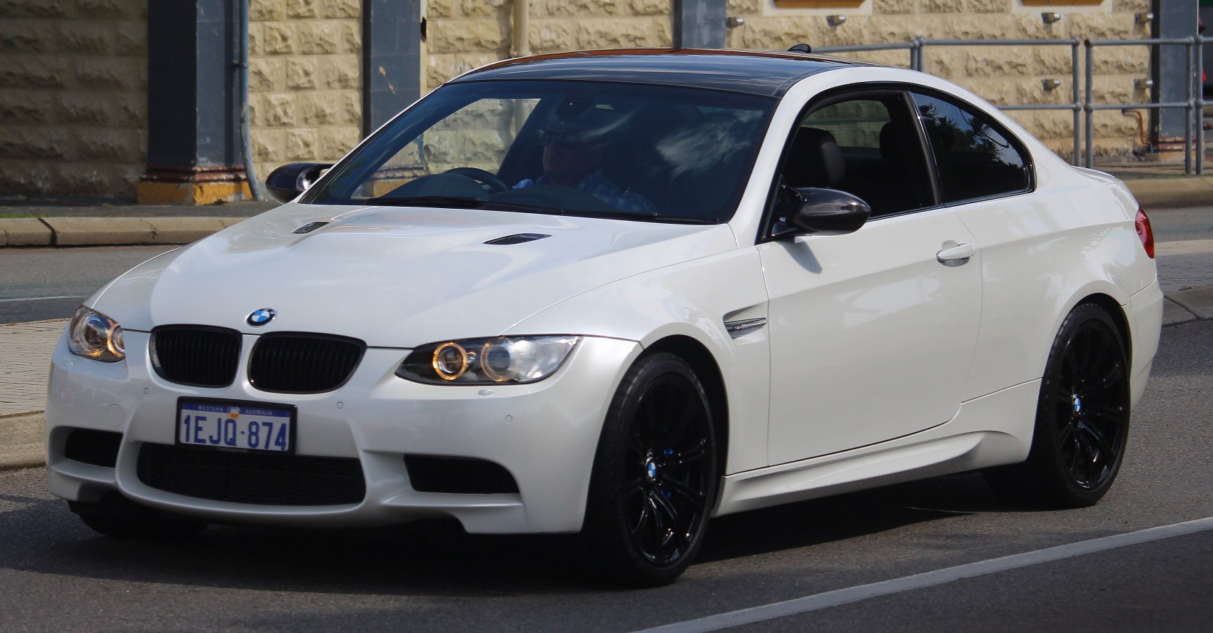Front angle with hood vents and black wheels