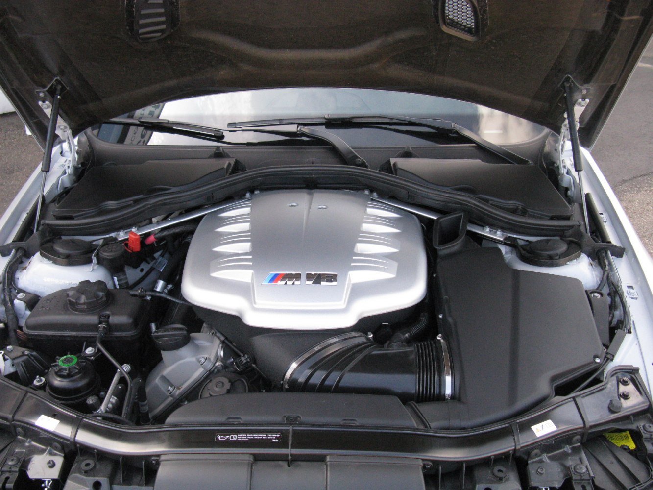 BMW M3 E90 LCI V8 engine bay with performance components