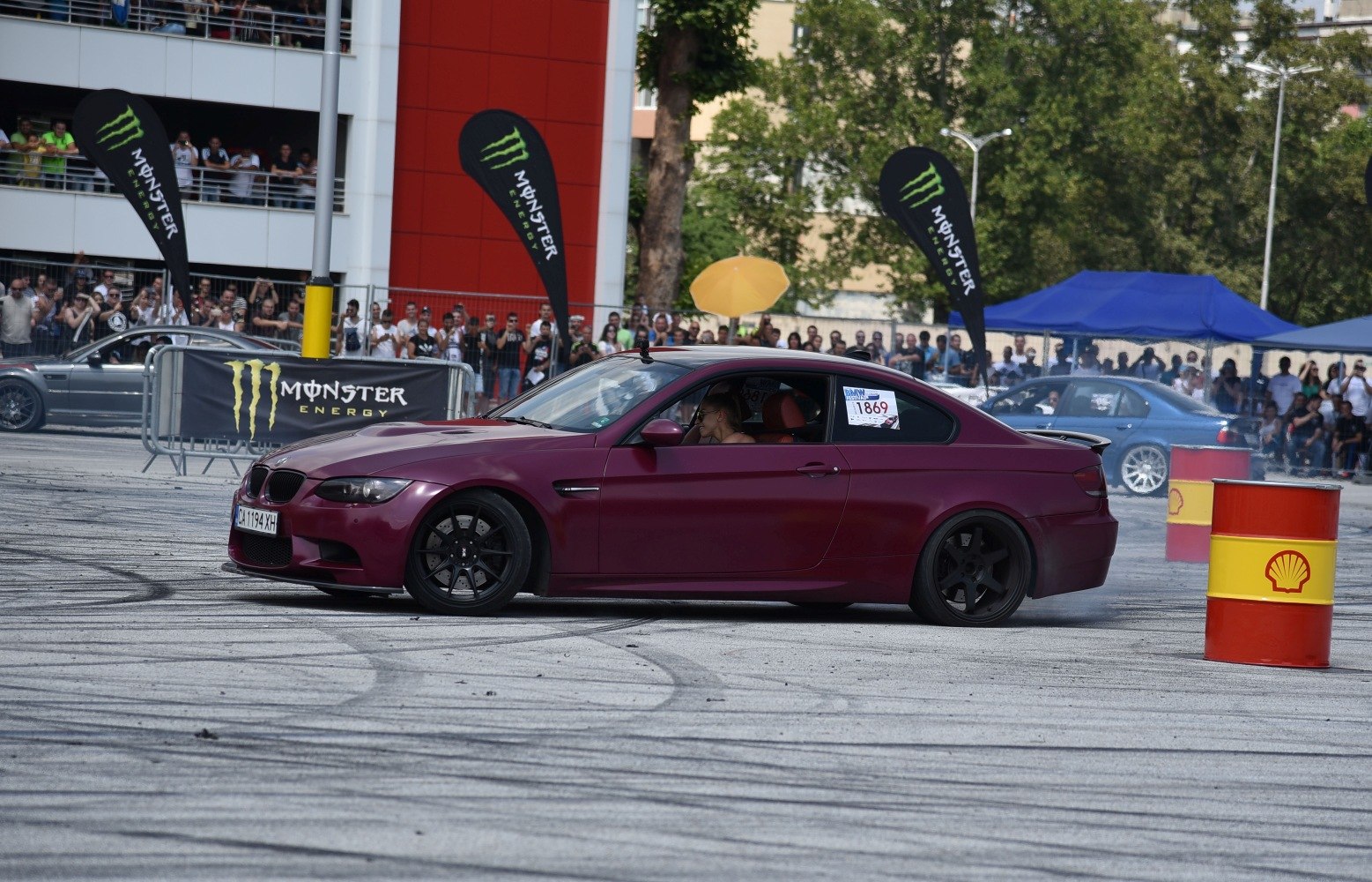 BMW M3 E92 coupe drifting with black wheels
