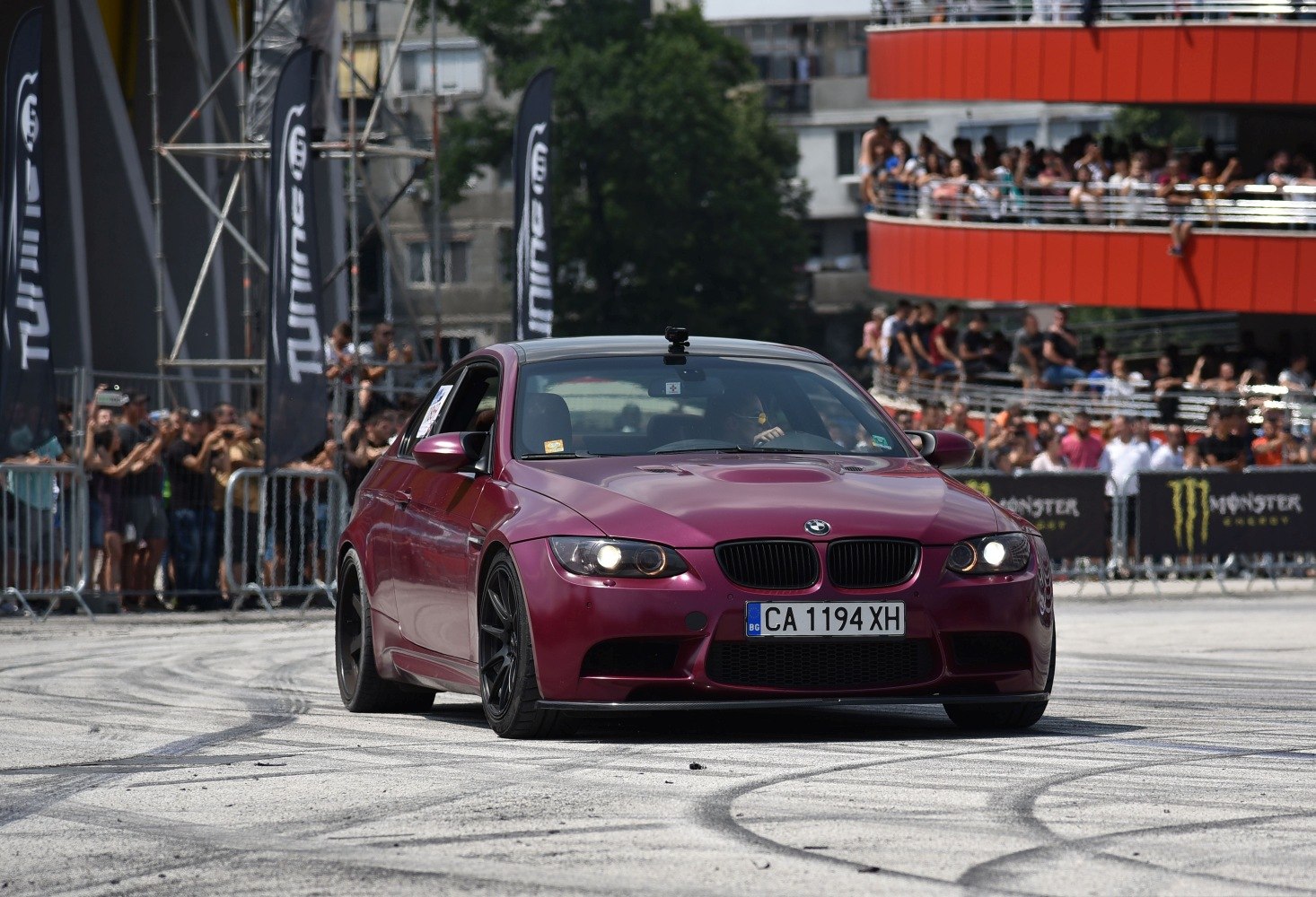 Matte purple BMW M3 E92 front view with sporty stance