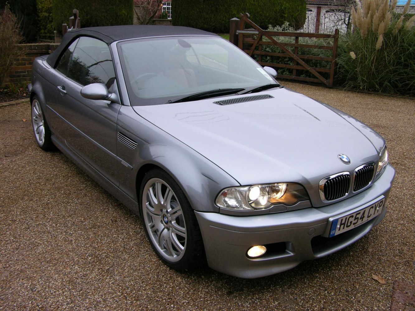 Front angle of a convertible with alloy wheels and fog lights