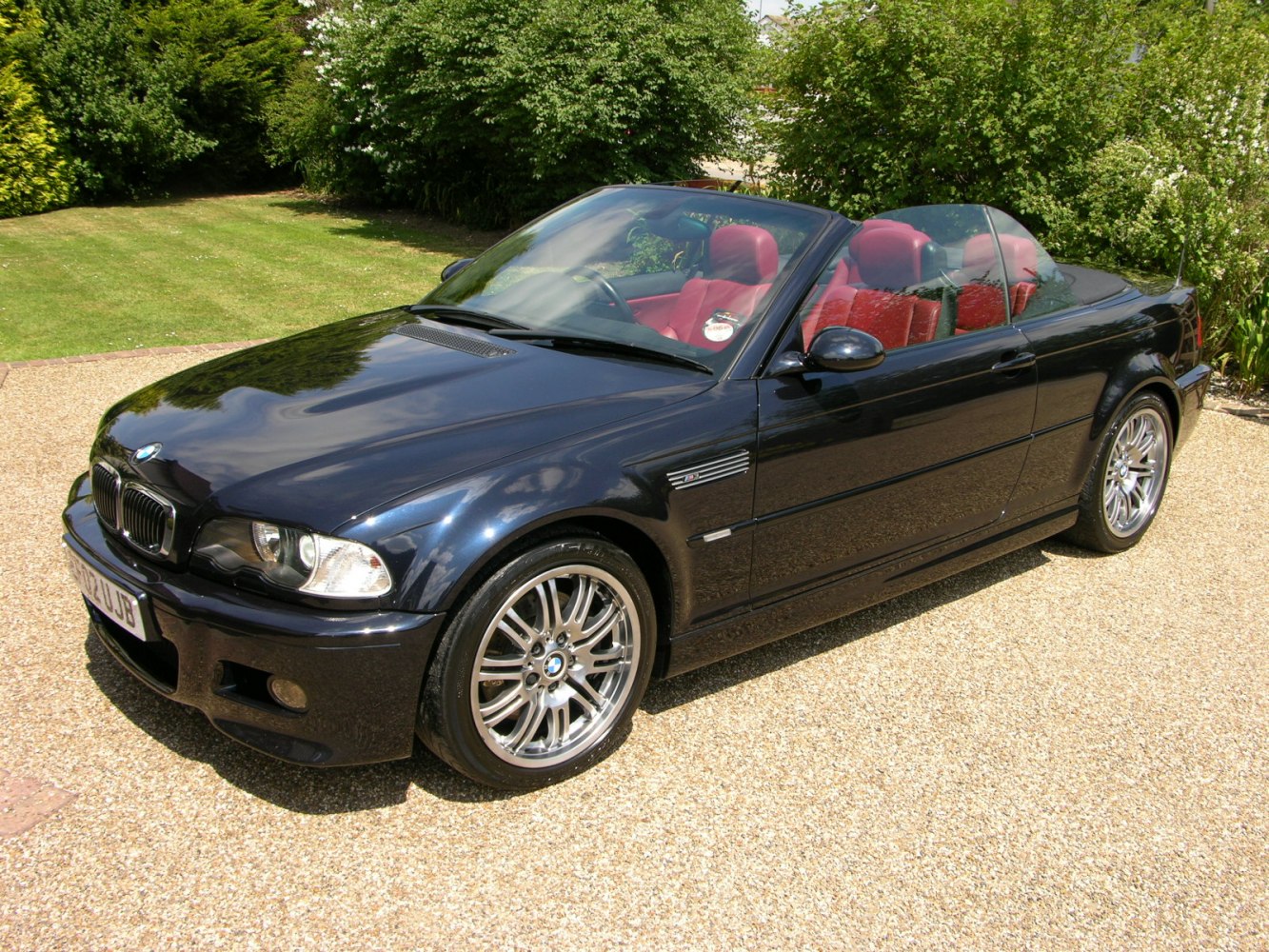 Convertible with red leather seats and alloy wheels