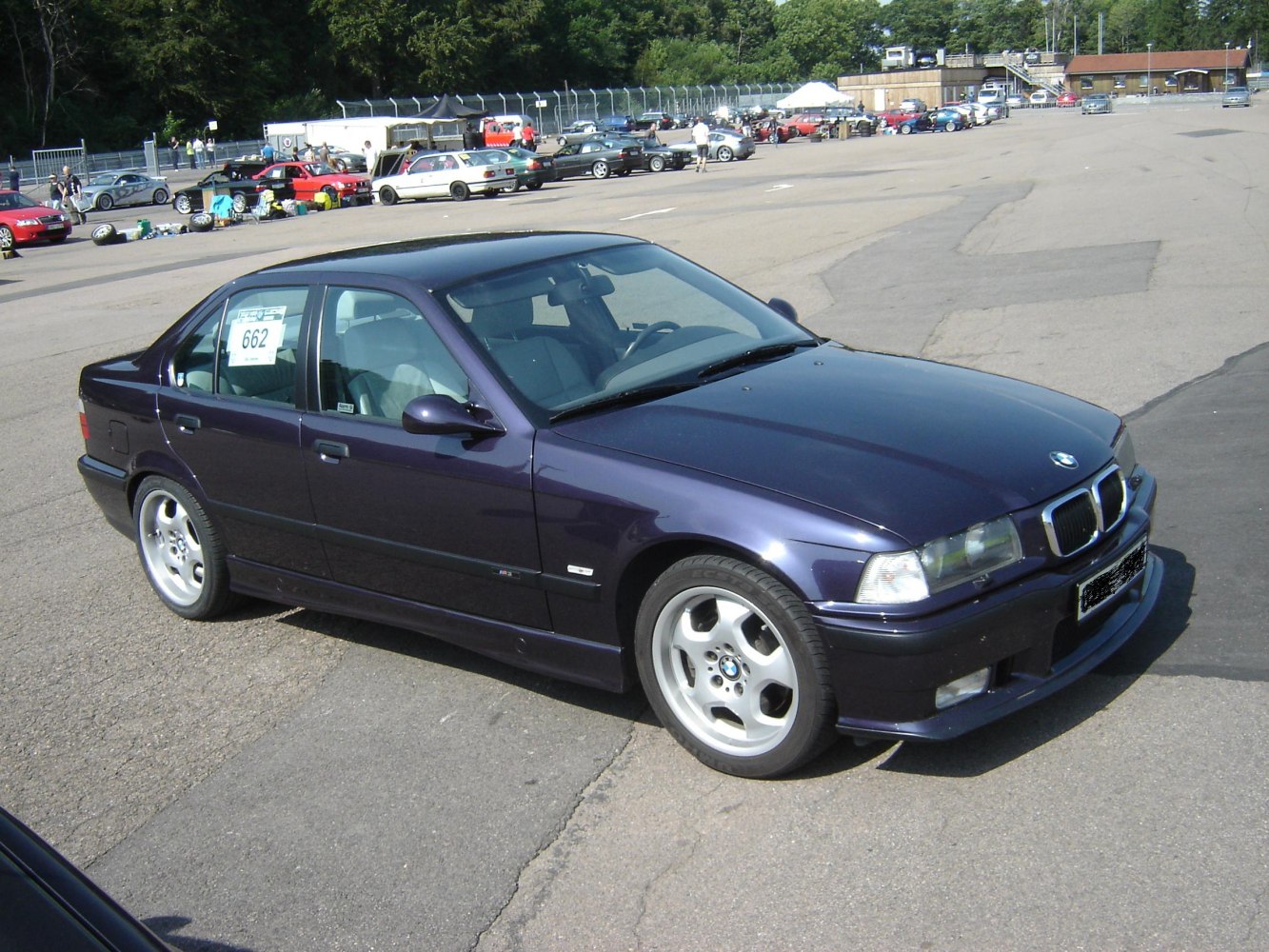 1995 sporty sedan with alloy wheels and aerodynamic aerodynamic body