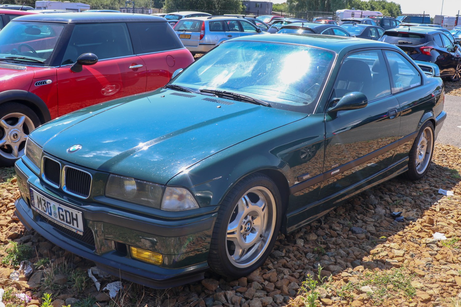 Aerodynamic two-door coupe with alloy wheels and sleek design