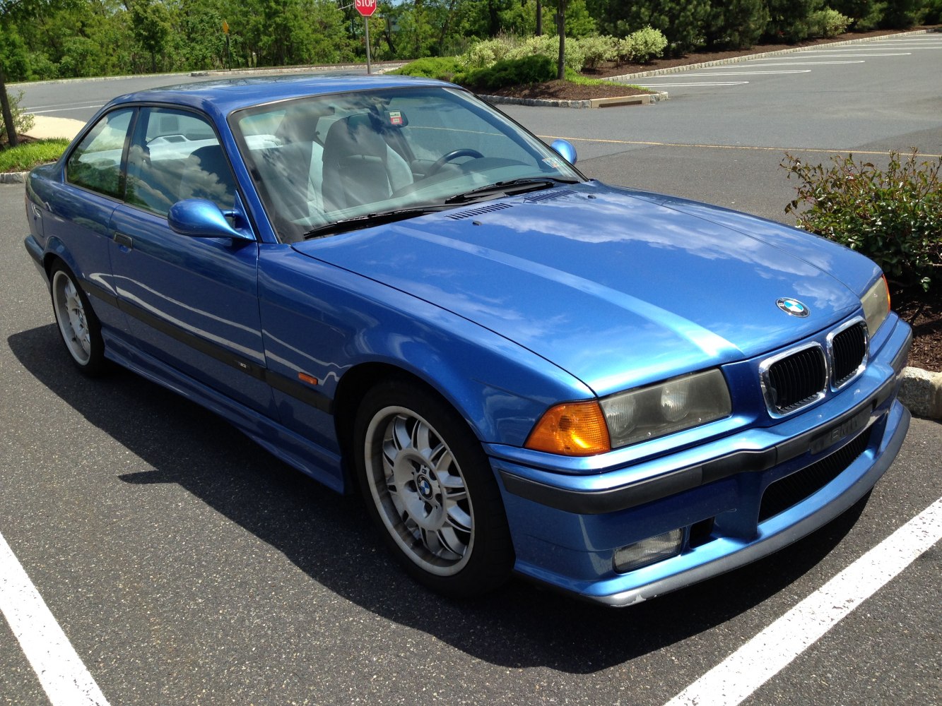 Front side view of classic BMW M3 Coupe E36 with alloy wheels