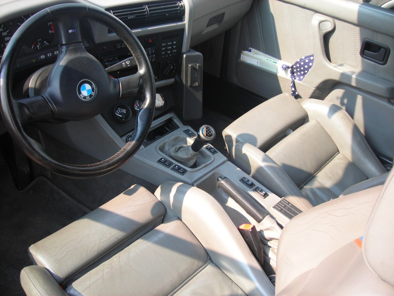 Classic interior with manual gear shift and iconic steering wheel