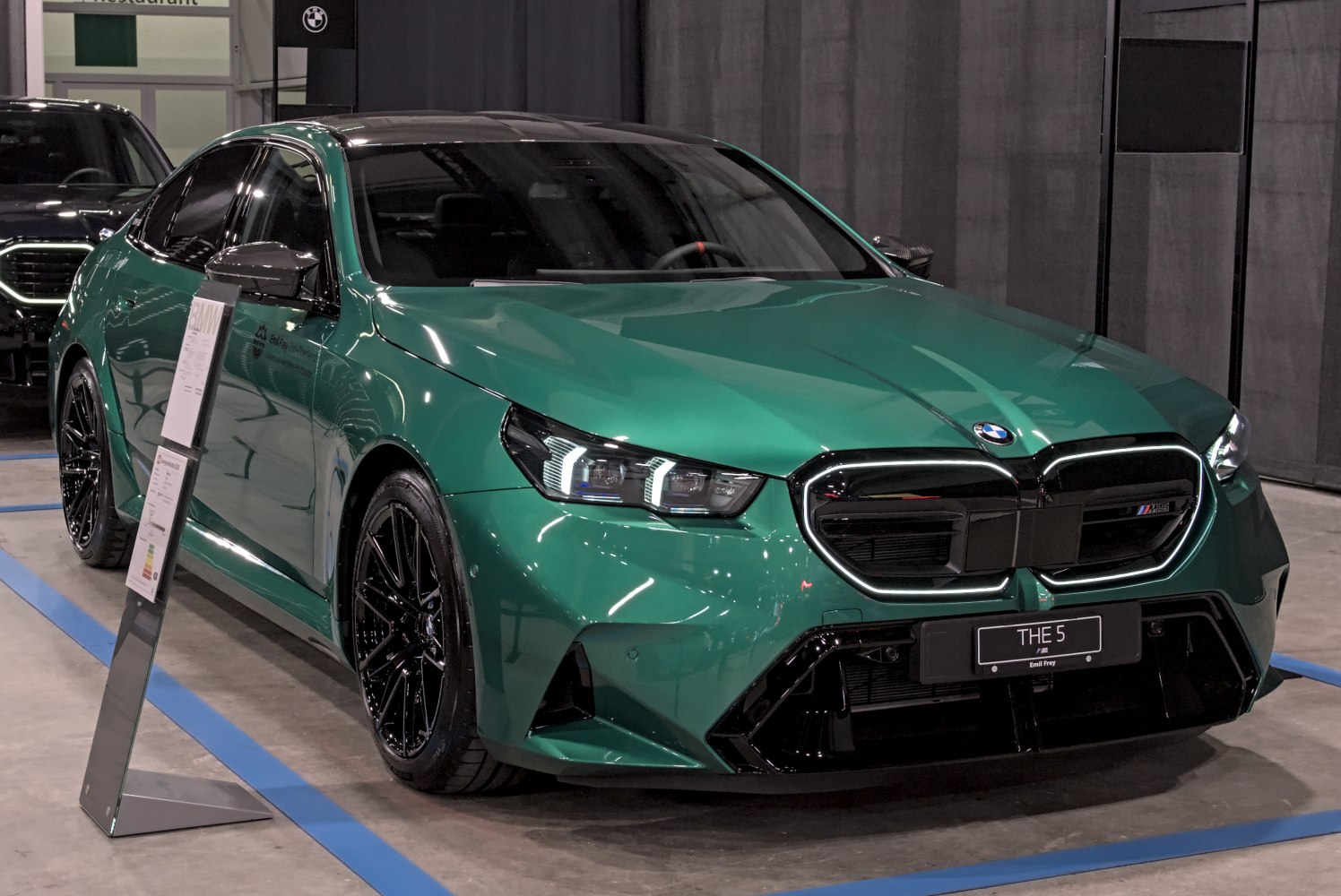 Front view of sports sedan with kidney grille and LED headlights