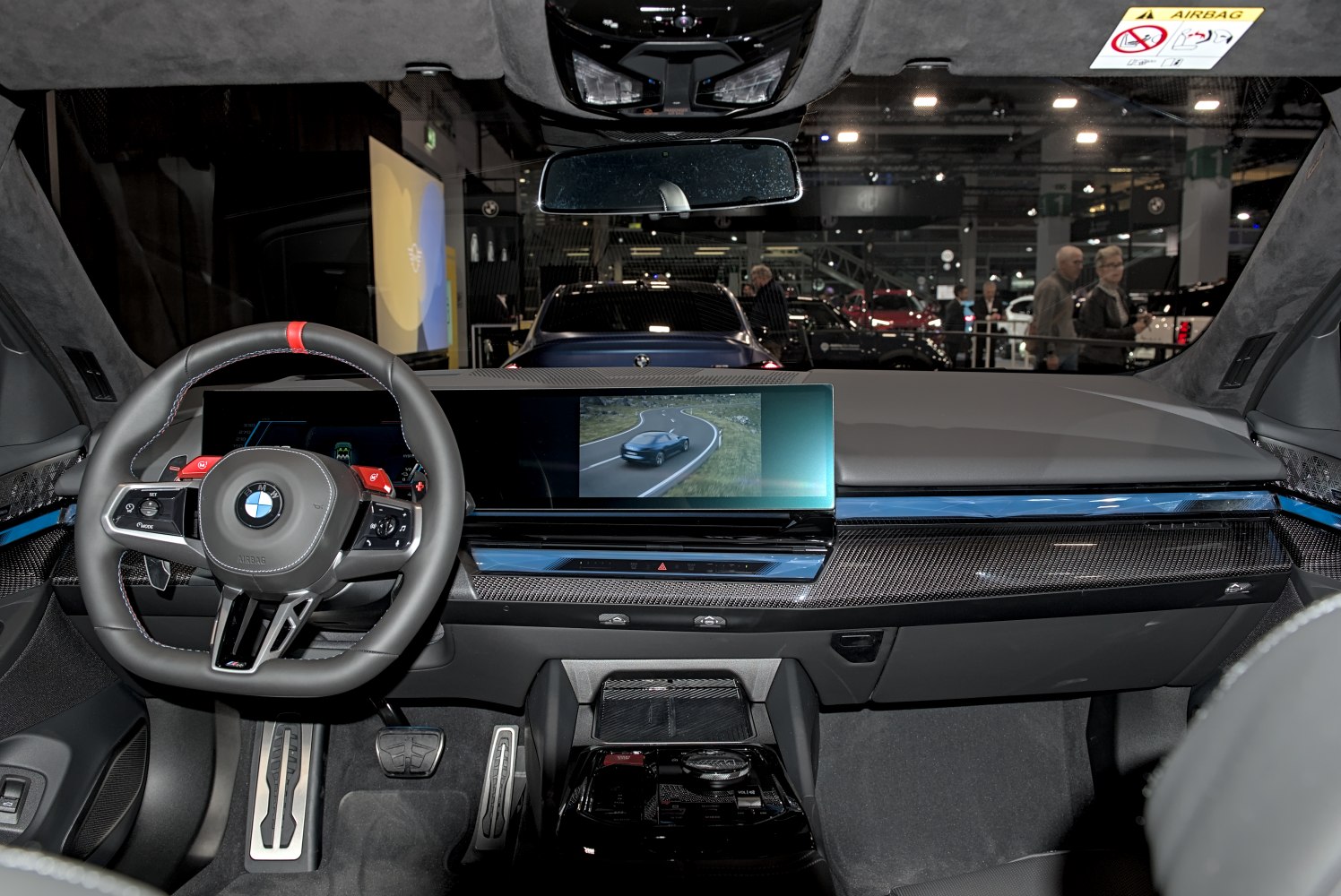 Digital dashboard, sports steering wheel, carbon fiber trim