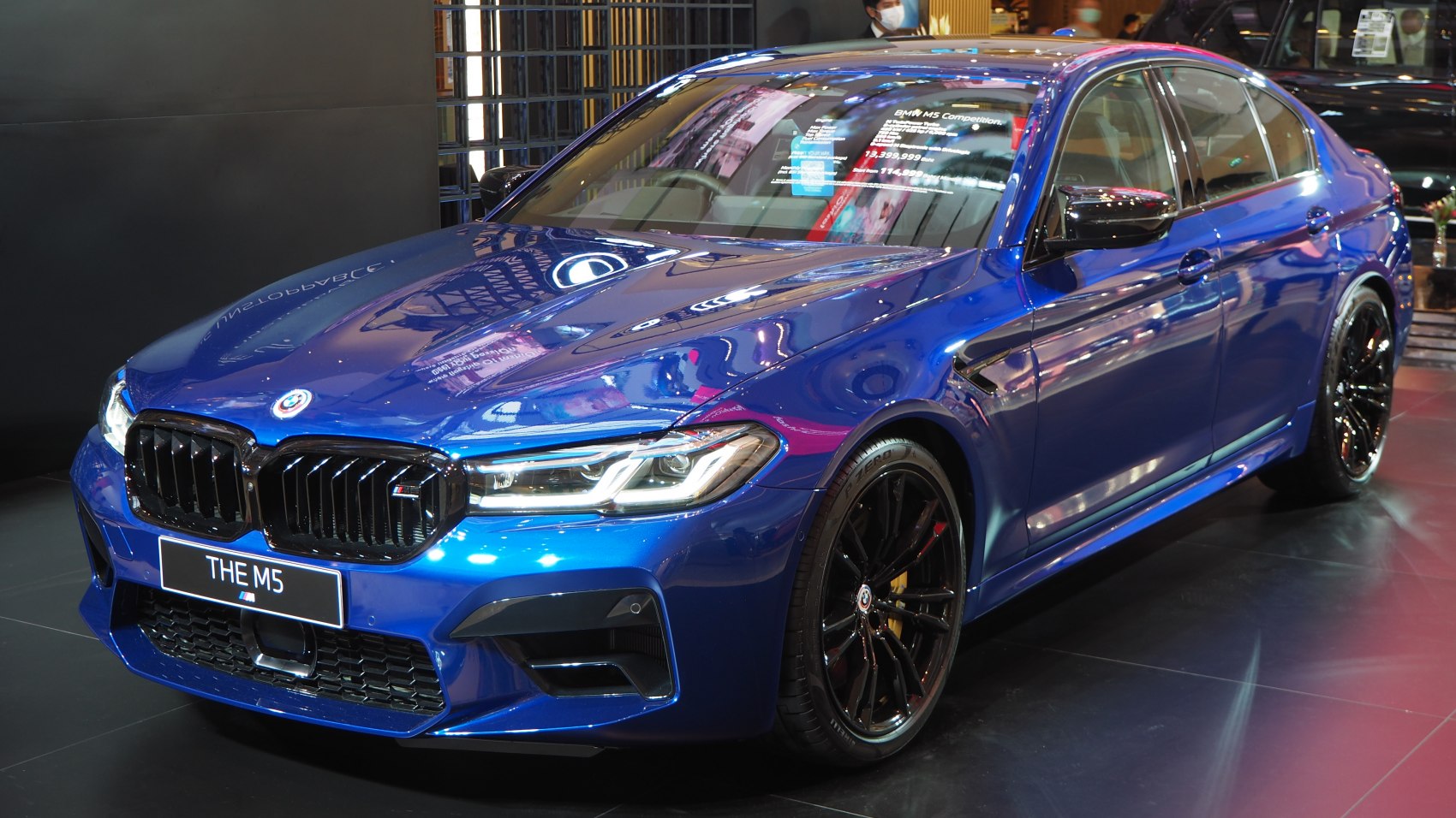 LED headlights and black sporty grille on a luxury sporty sedan