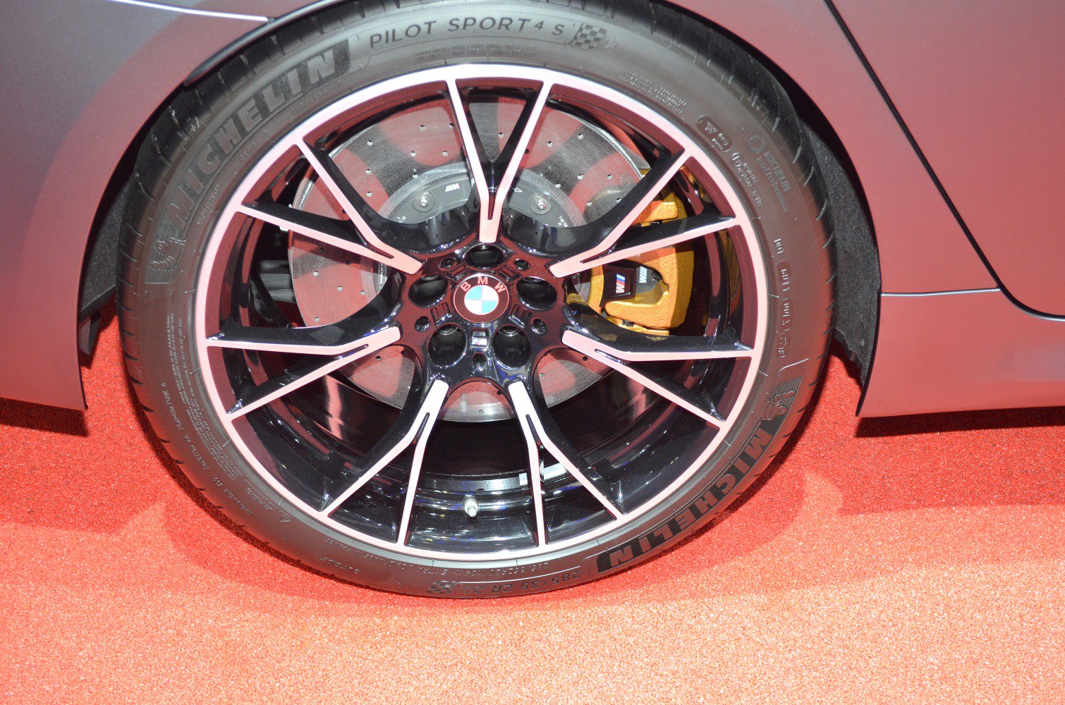 Close-up of a sporty wheel with Michelin tires and large brake calipers