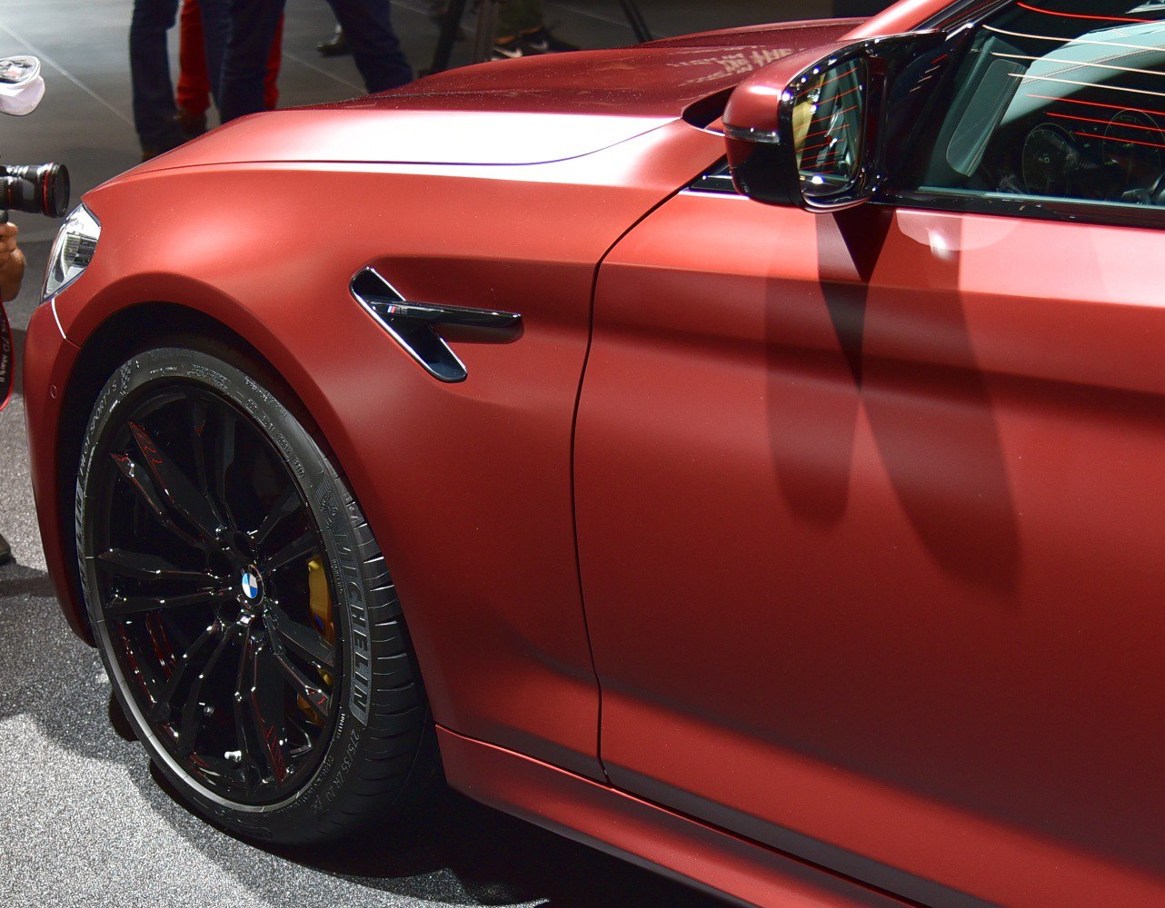 Front fender and black alloy wheel with side mirror