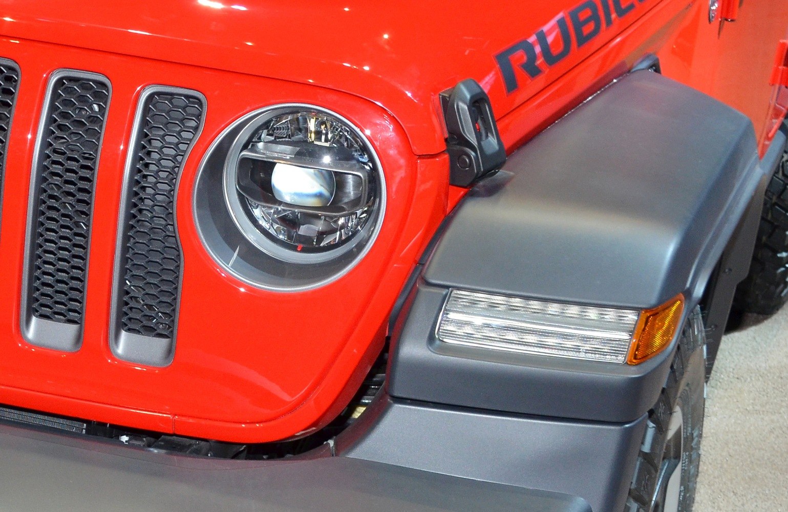 Round headlight and rugged front fender close-up