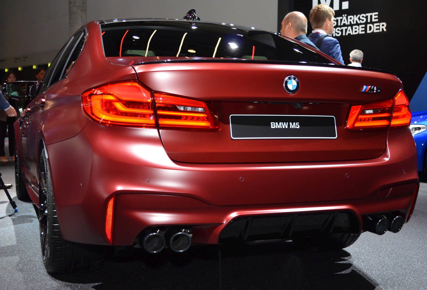 Quad exhaust pipes and LED tail lights on sporty sedan rear