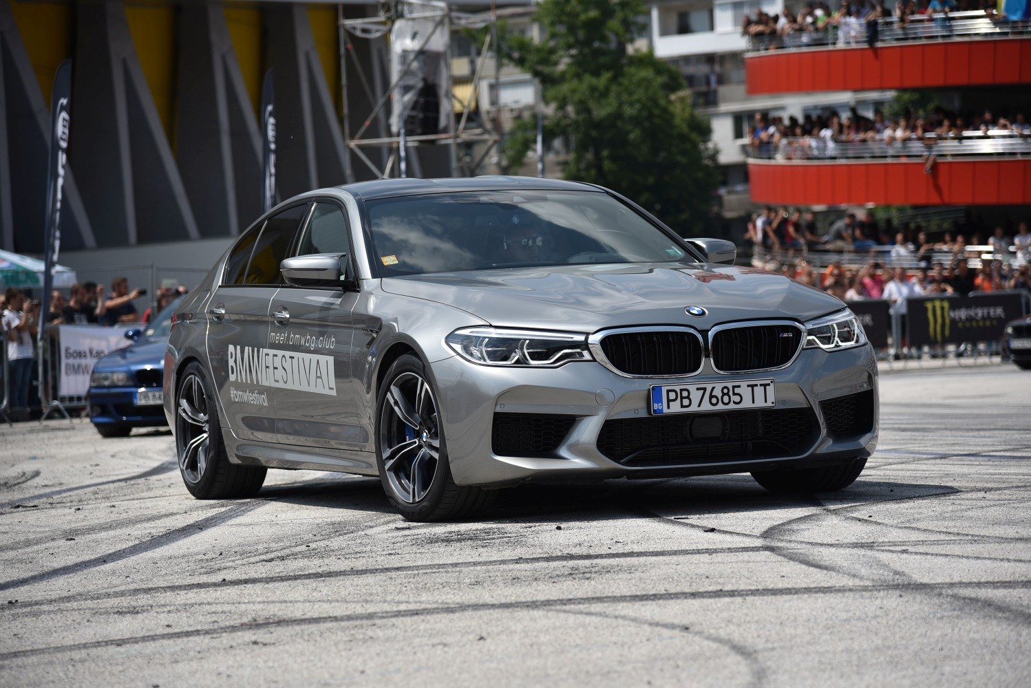 Sporty front design with aggressive grille and performance wheels
