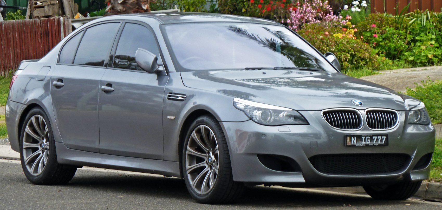 Front side view of 2008 BMW M5 E60 LCI with kidney grille and alloy wheels