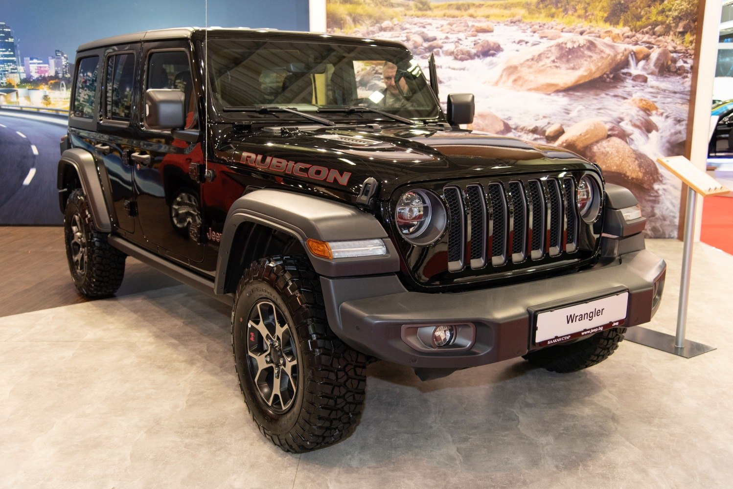 Off-road SUV with rugged tires and seven-slot grille