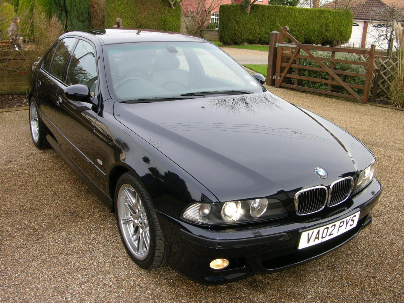 Front and side view with headlights and kidney grille
