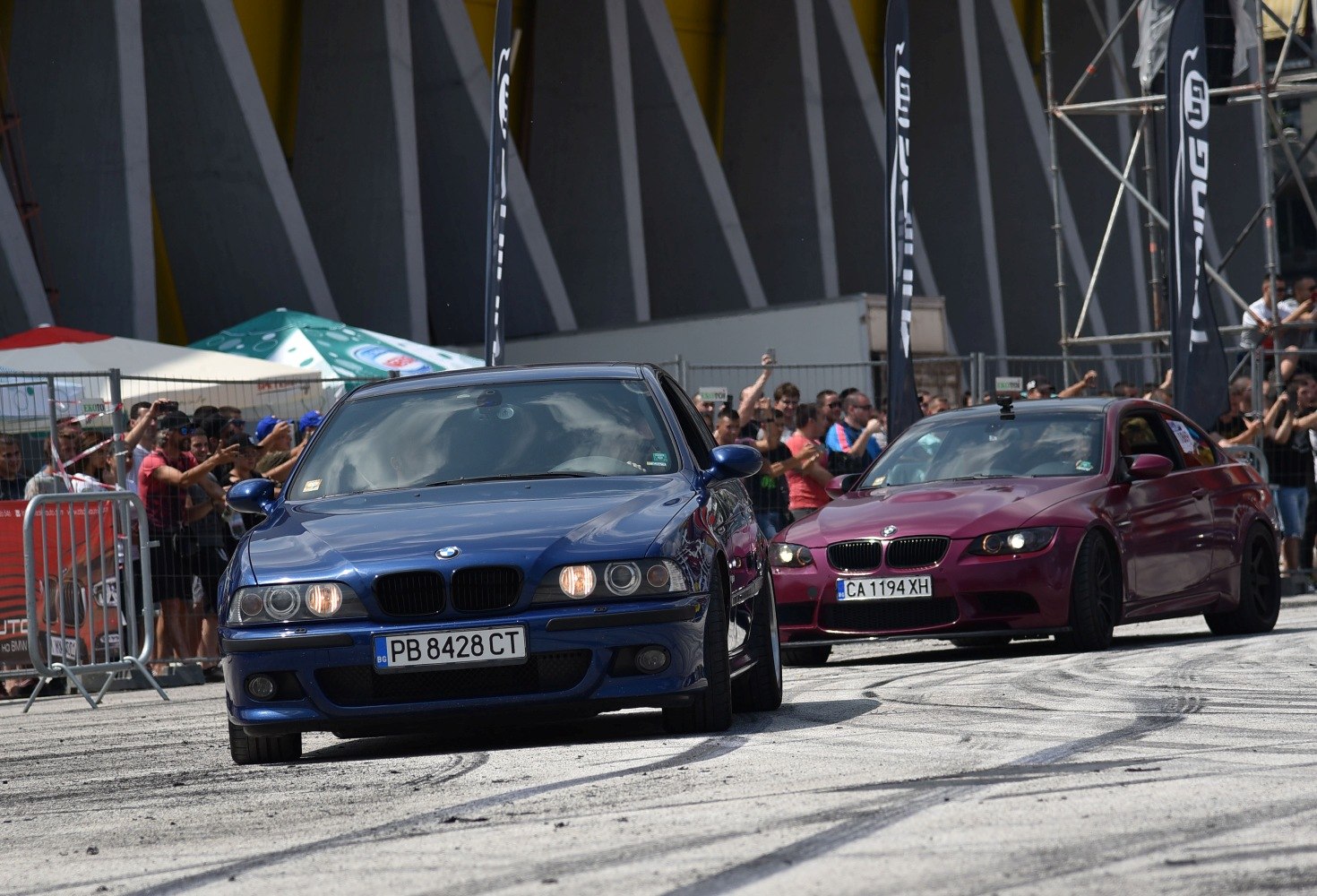 Front view of a BMW M5 with distinct headlights and grille