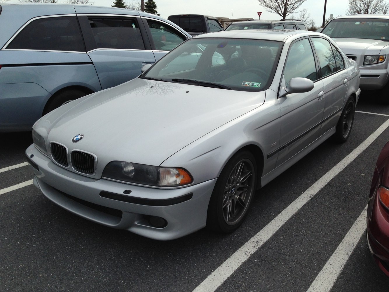 Silver sedan with kidney grille and sporty alloy wheels