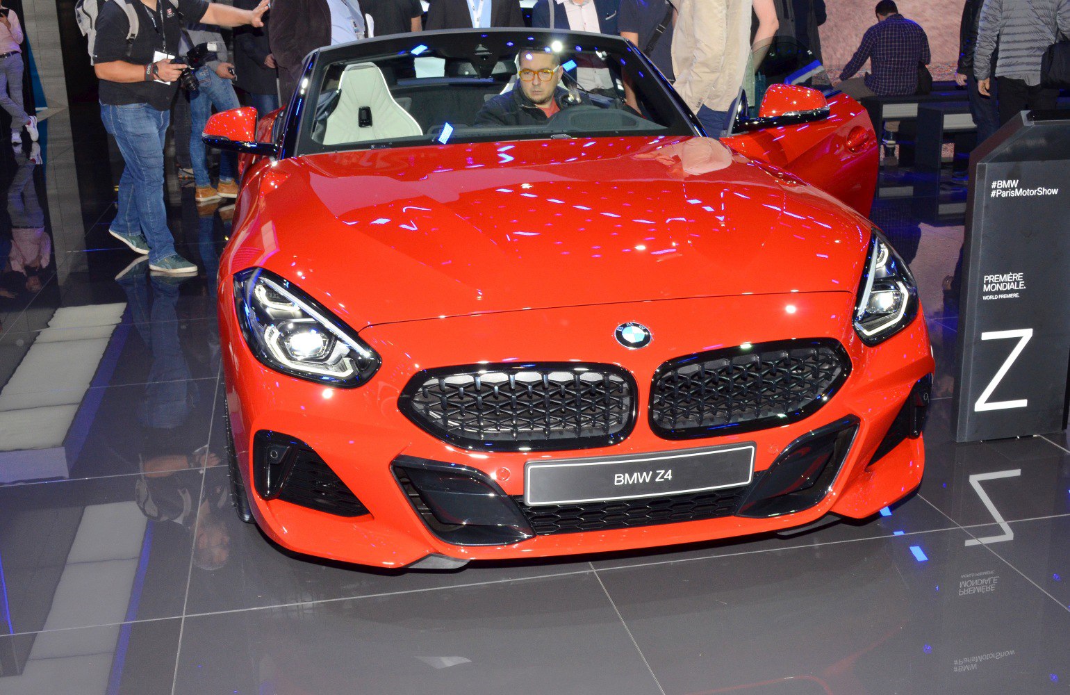 Aggressive front grille and LED headlights of a sports convertible