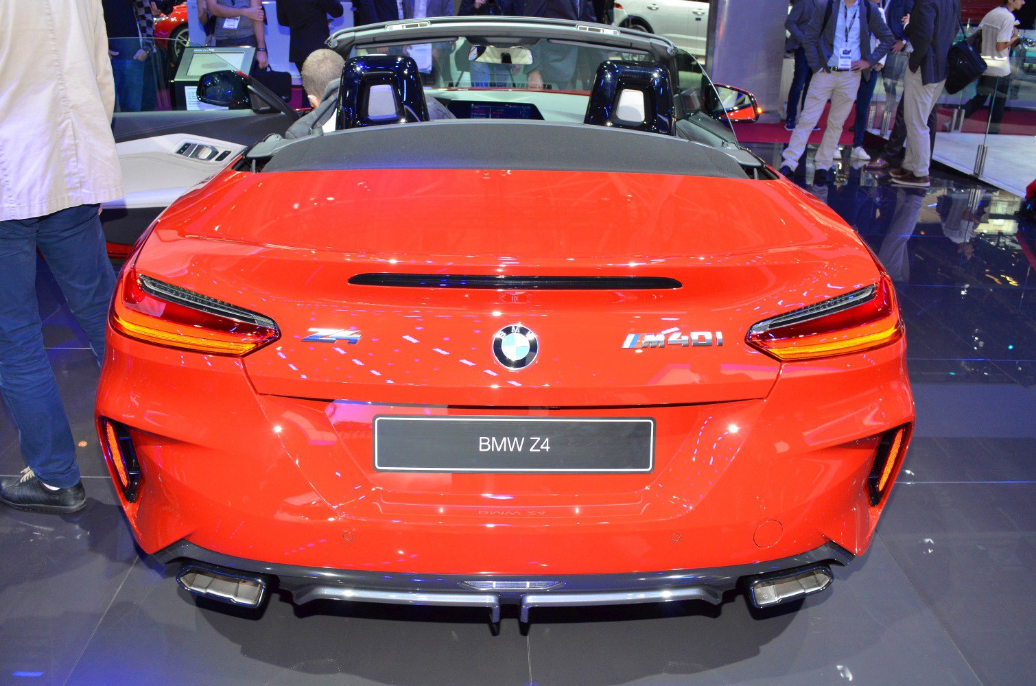 Rear view of sporty convertible with dual exhausts and sleek LED tail lights