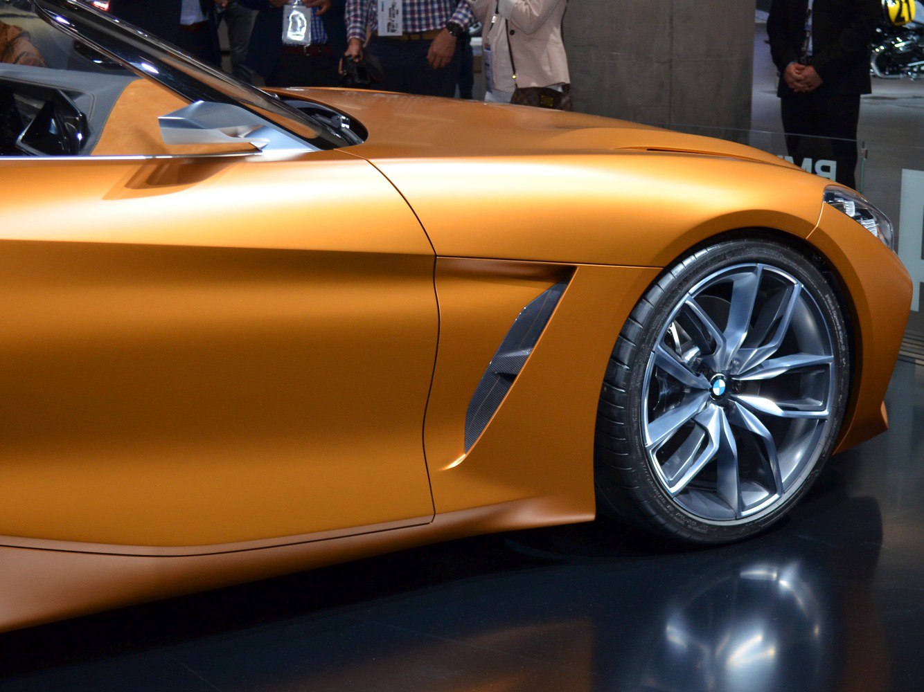 Sleek side profile with side vent and large alloy wheel