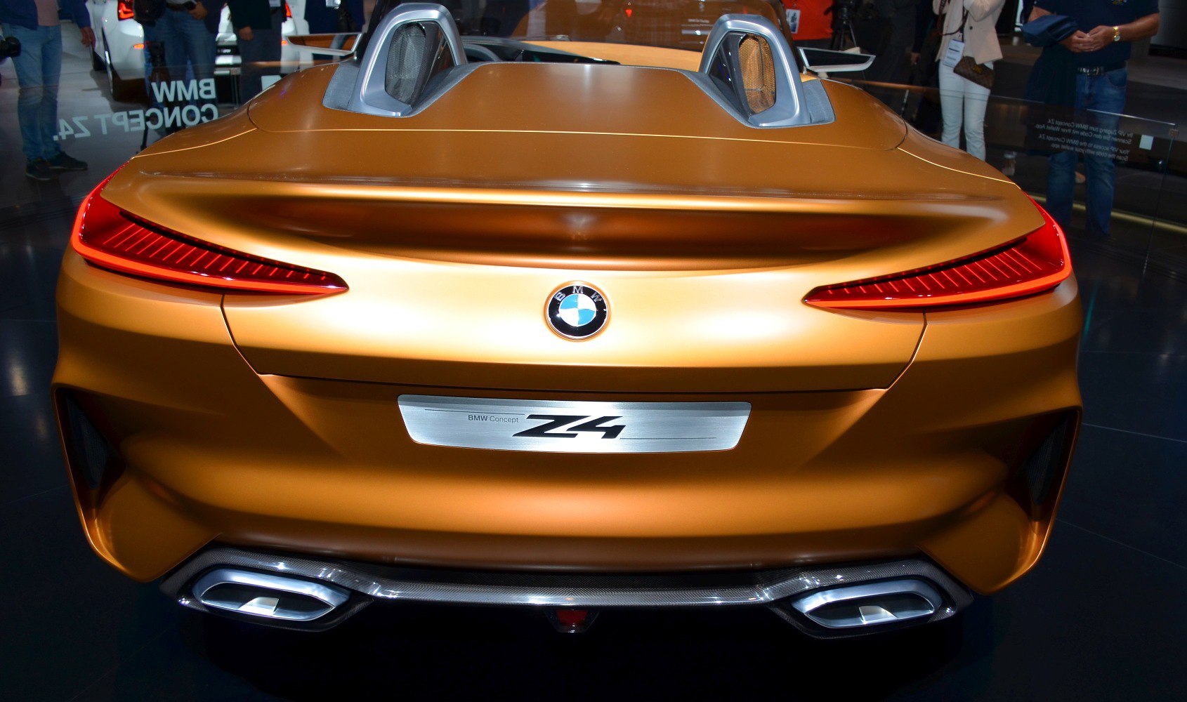 Sleek rear design with distinctive tail lights and integrated exhaust outlets