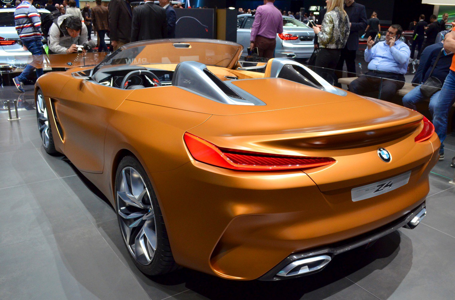 Rear view with distinctive taillights and sporty dual exhausts.