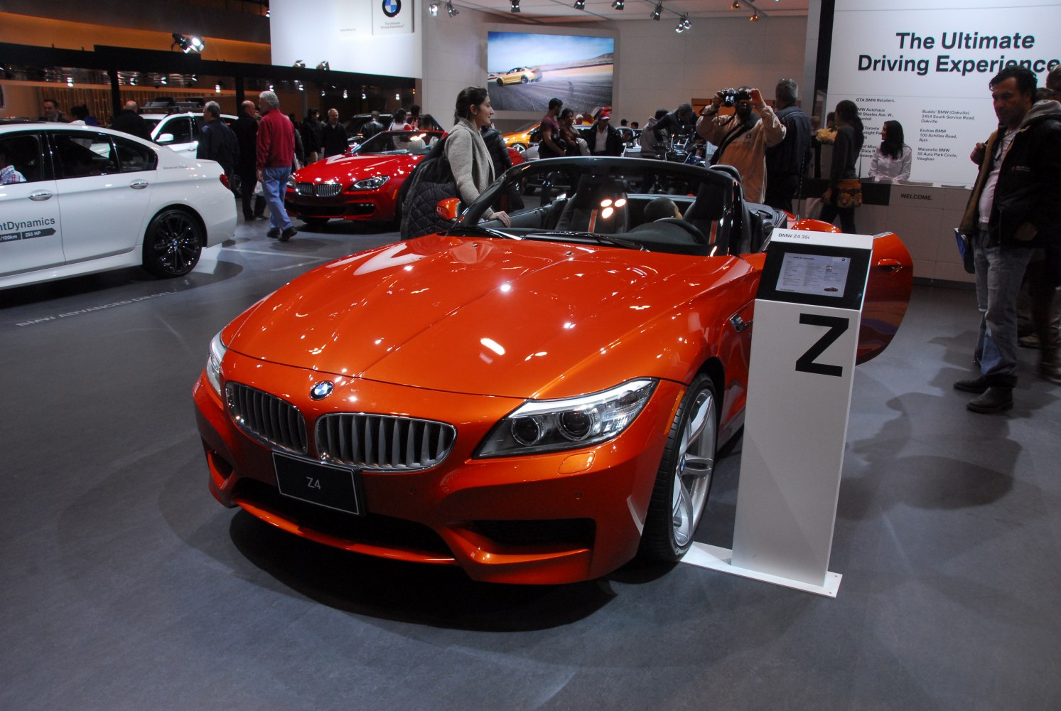 Orange convertible roadster with distinctive front grille and open top