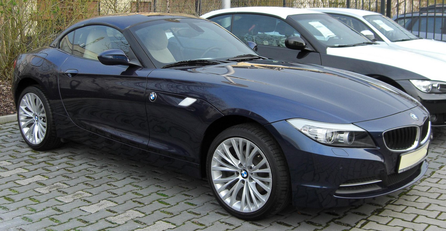 Convertible sports car with alloy wheels and sleek curved body