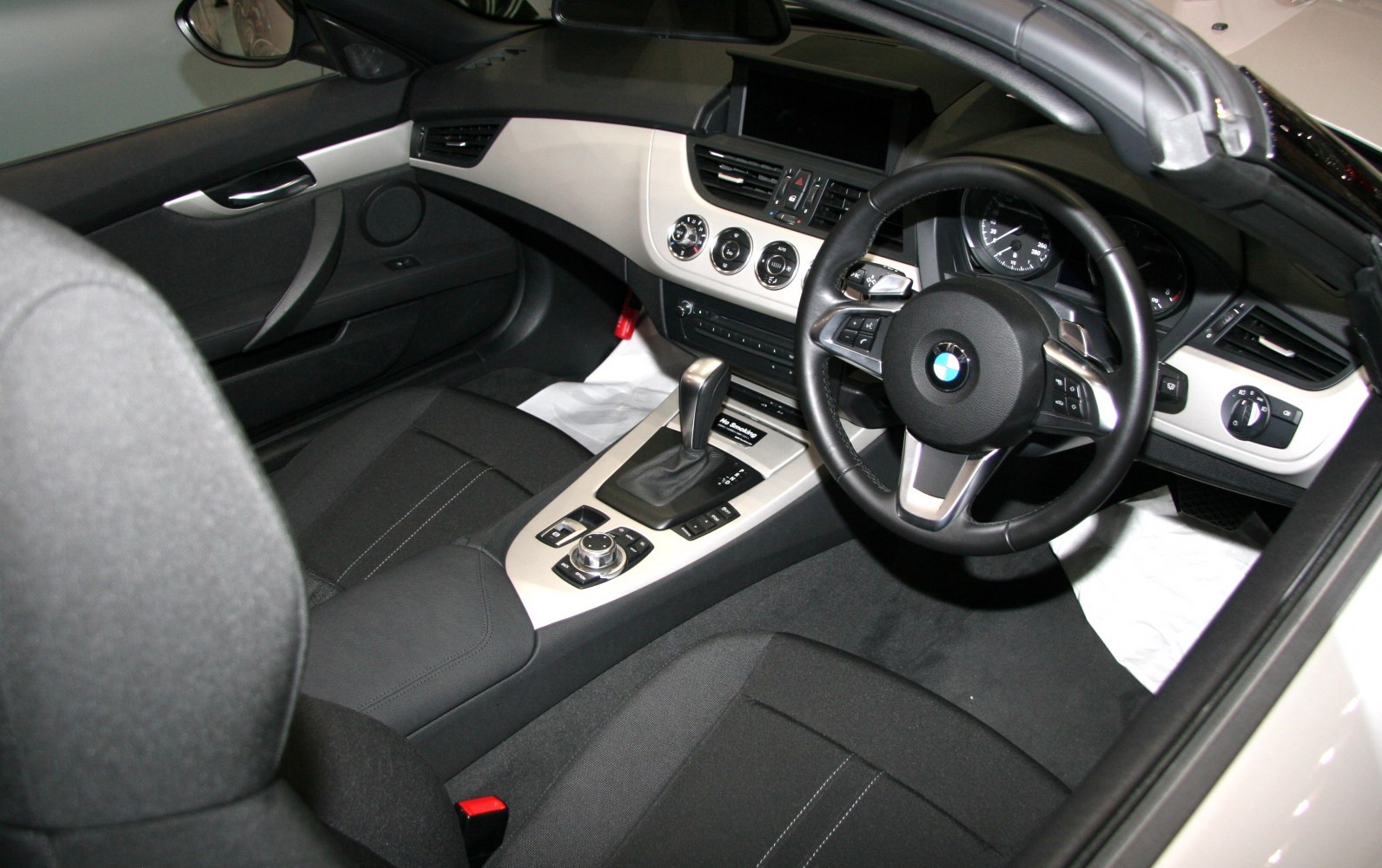 Dashboard and steering wheel of a modern sports convertible