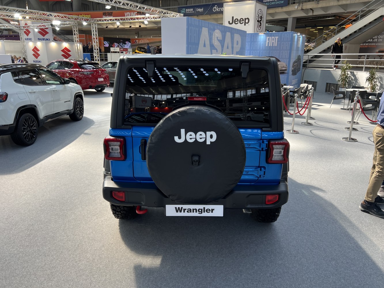 Rear view with spare tire cover and distinct tail lights