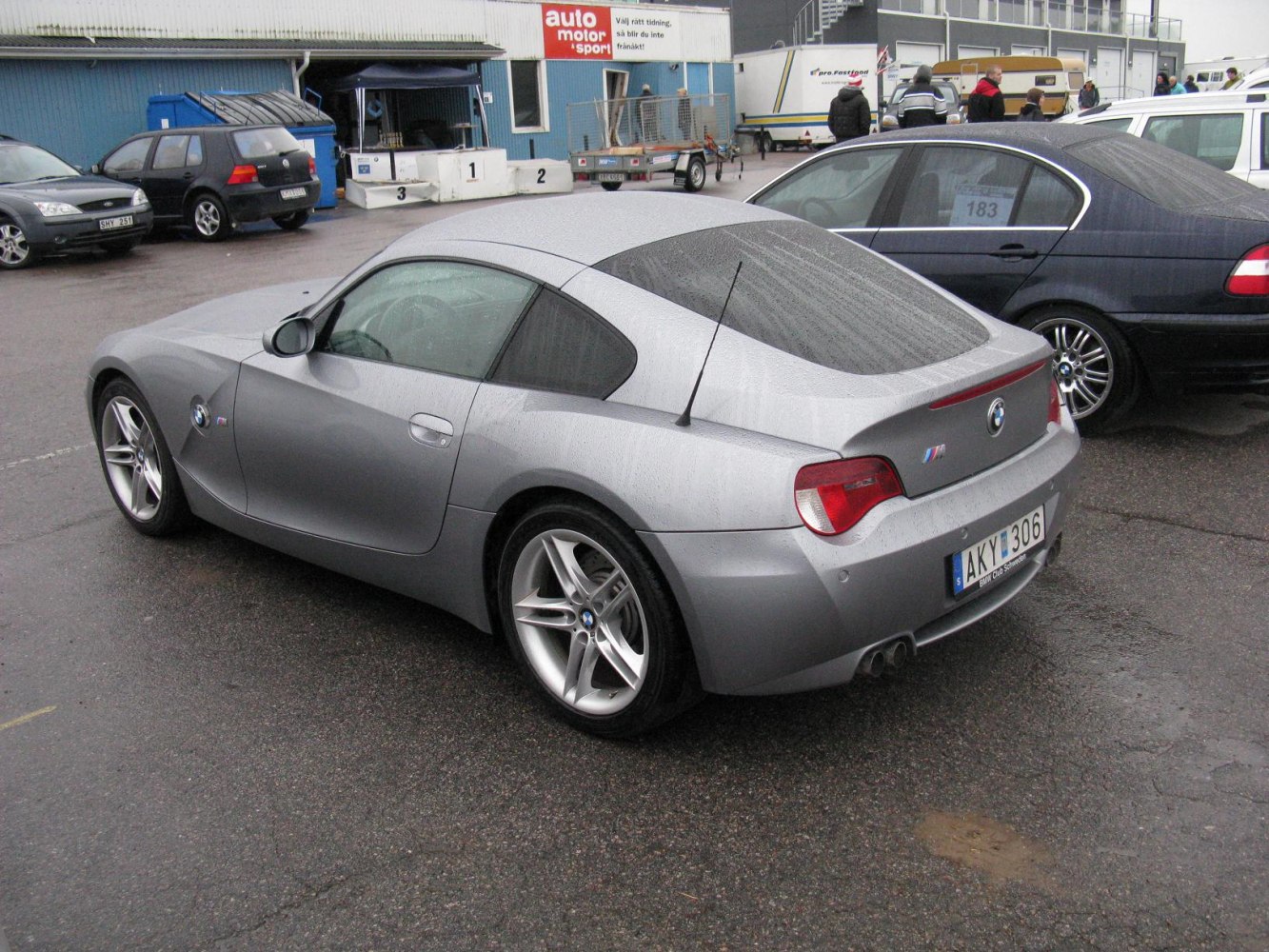 Silver BMW Z4 Coupe rear and side profile