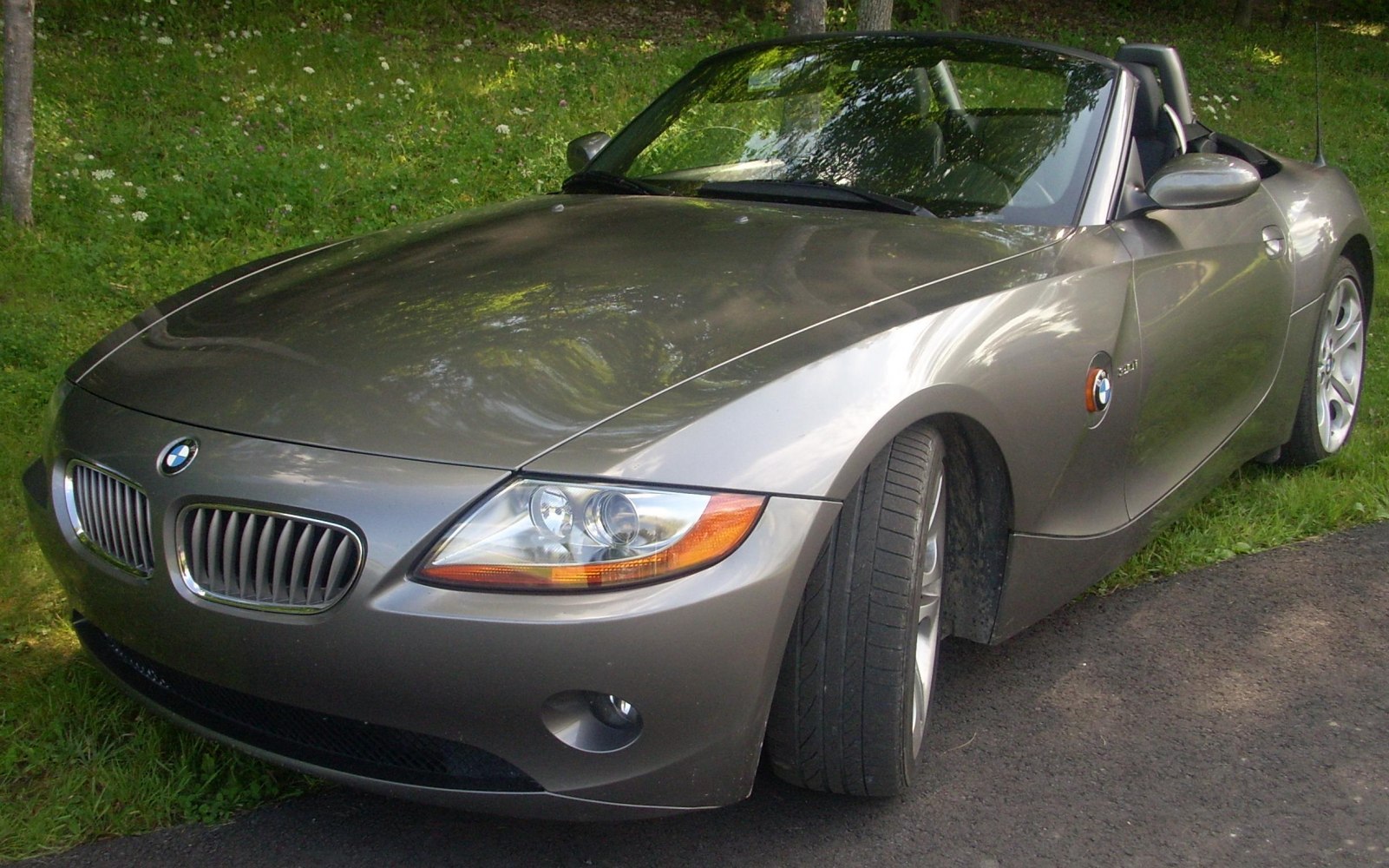 Convertible front view showing grille and headlights