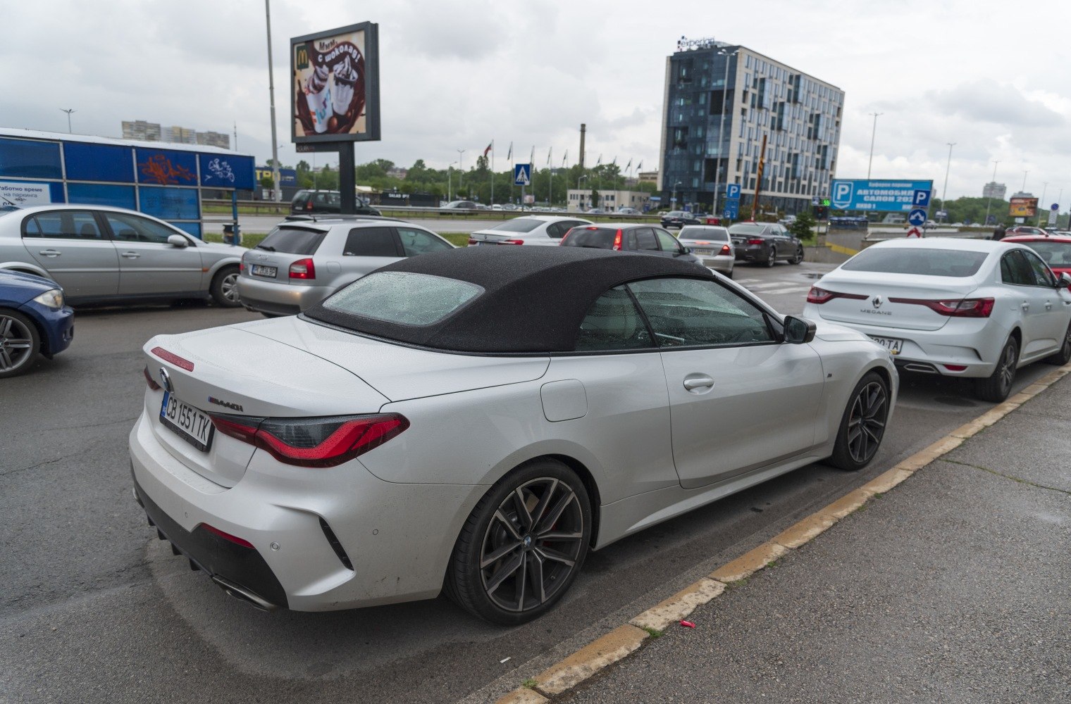 Soft top convertible rear view with sporty alloy wheels and sleek taillights
