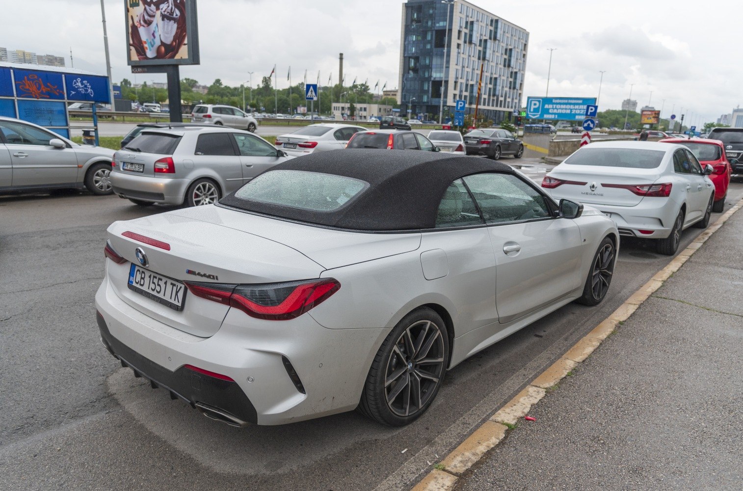 Soft top convertible rear with sporty tail lights and dual exhaust design