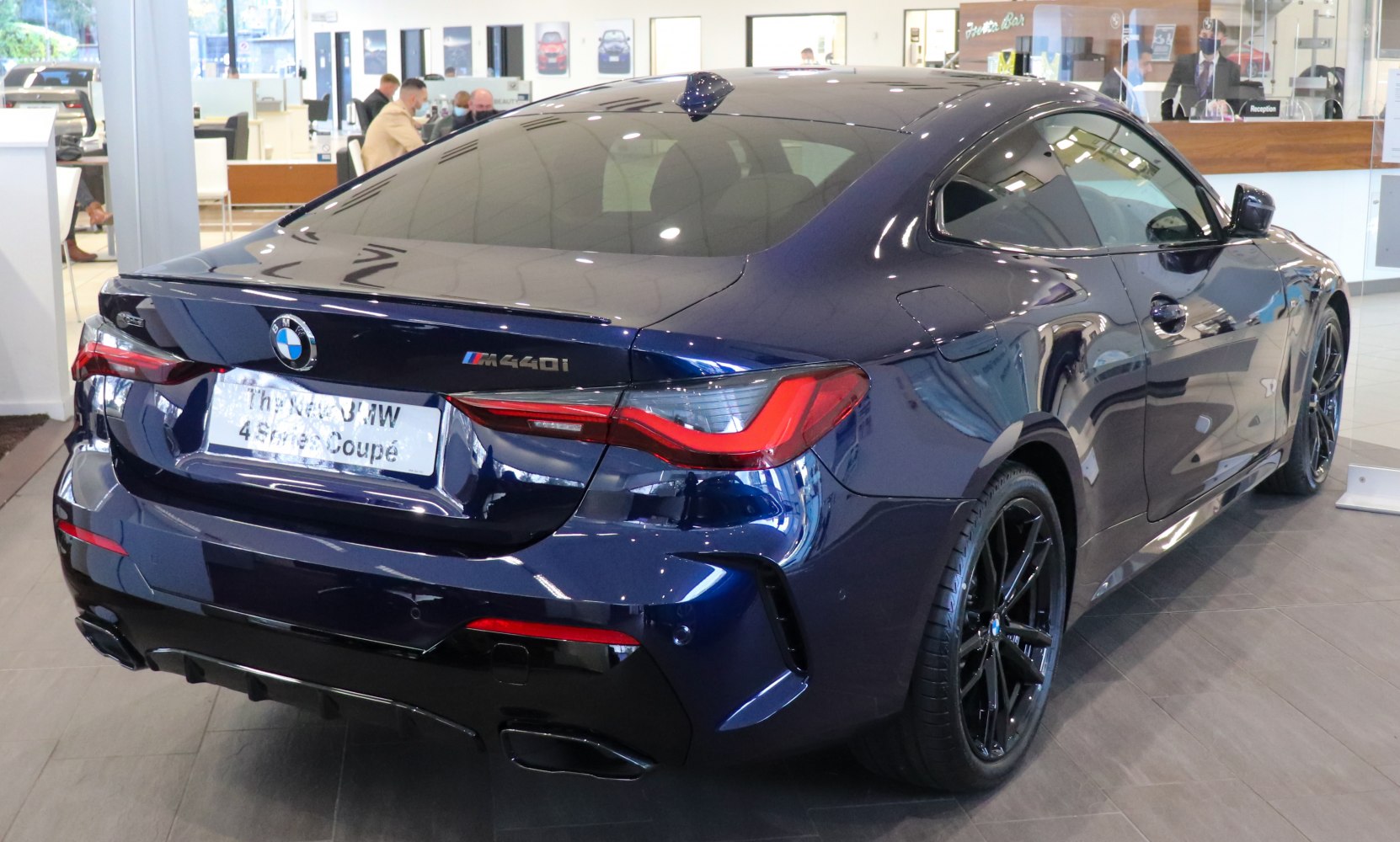 Rear design with sleek taillights and black alloy wheels