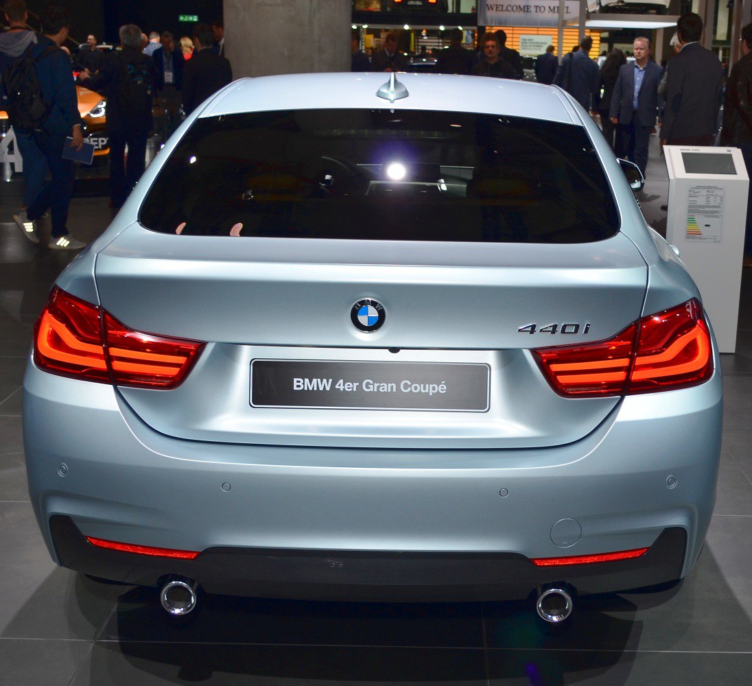 Rear view with LED tail lights and dual exhausts on a sedan