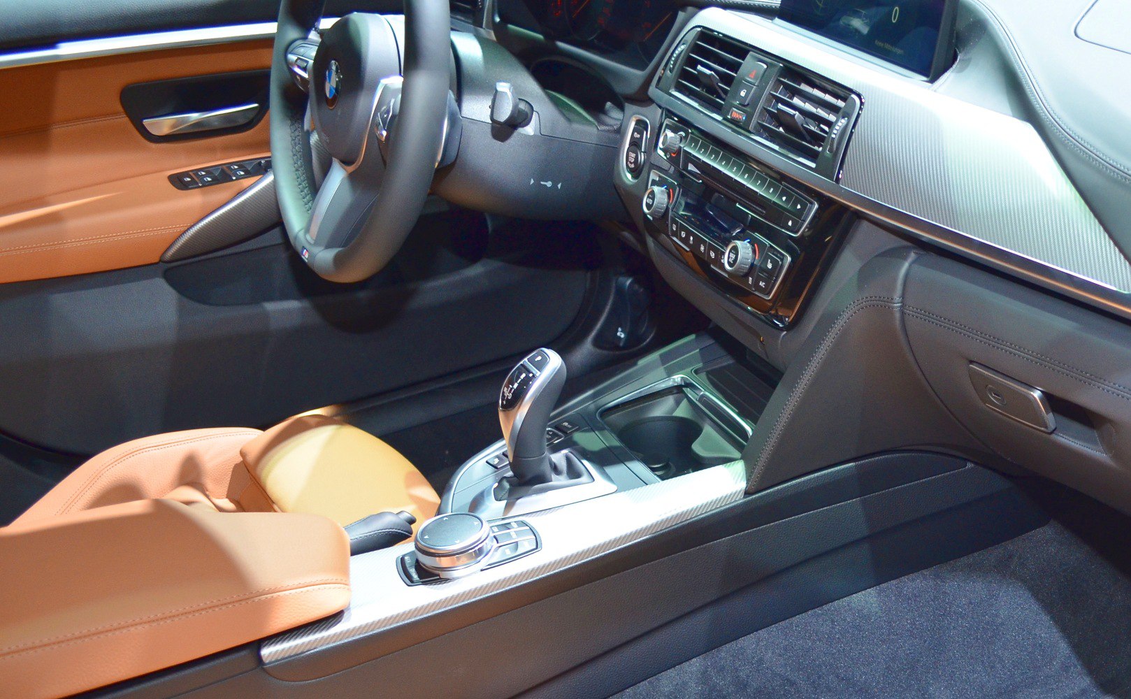 Interior shot with automatic gear shift and dashboard controls
