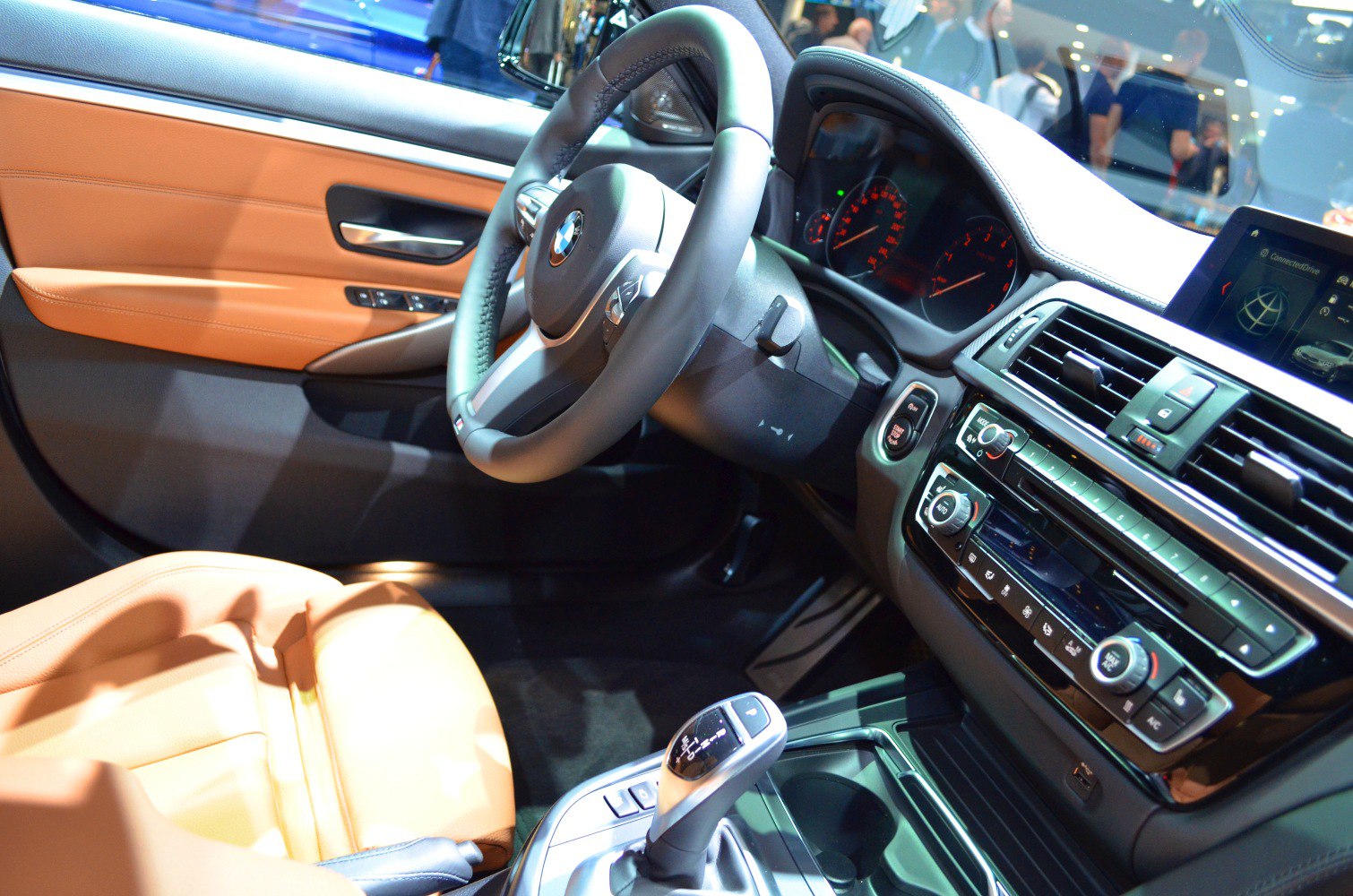 Steering wheel, dashboard, gear shift interior details
