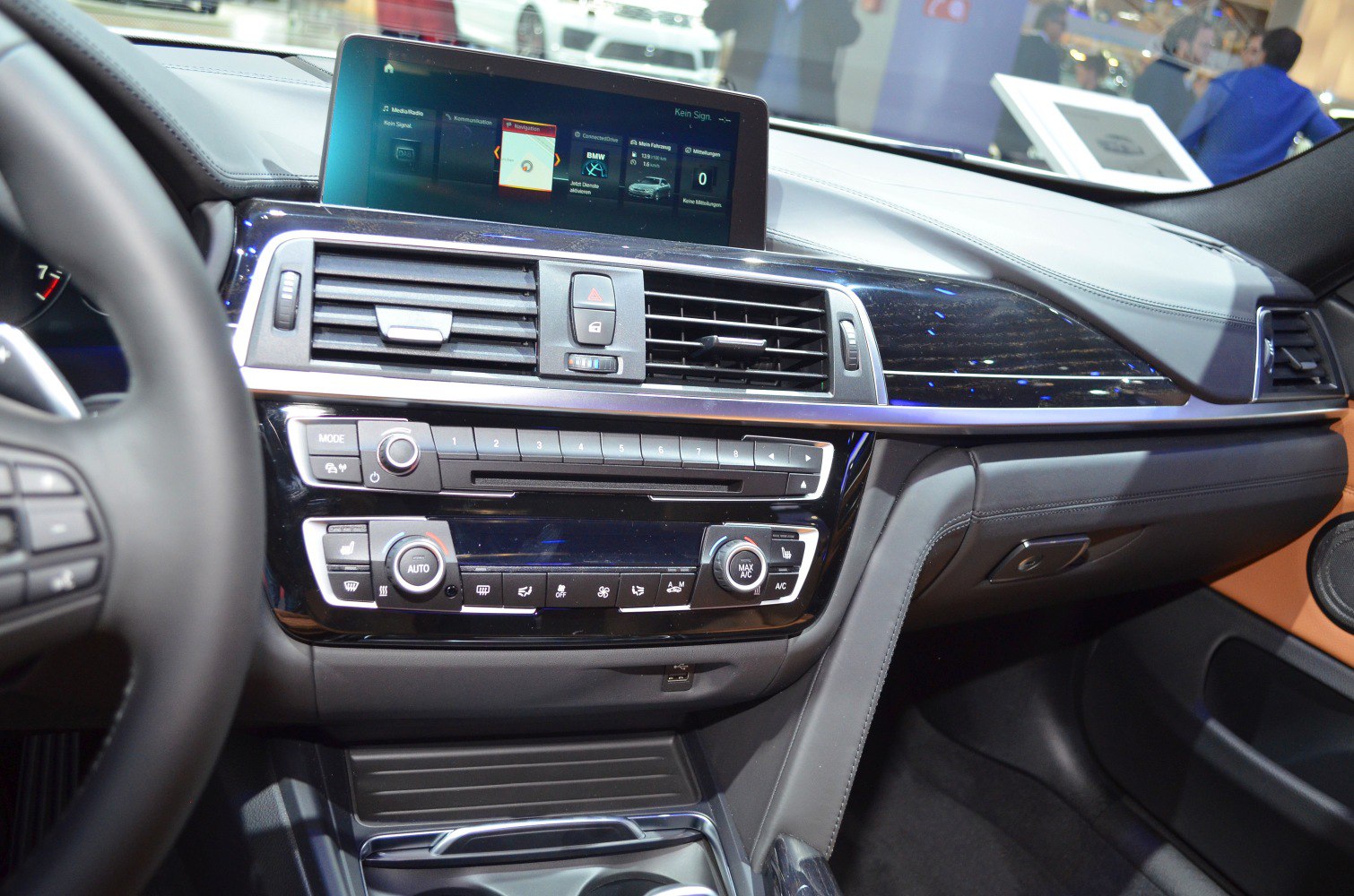 Interior dashboard with multimedia display and climate control panel