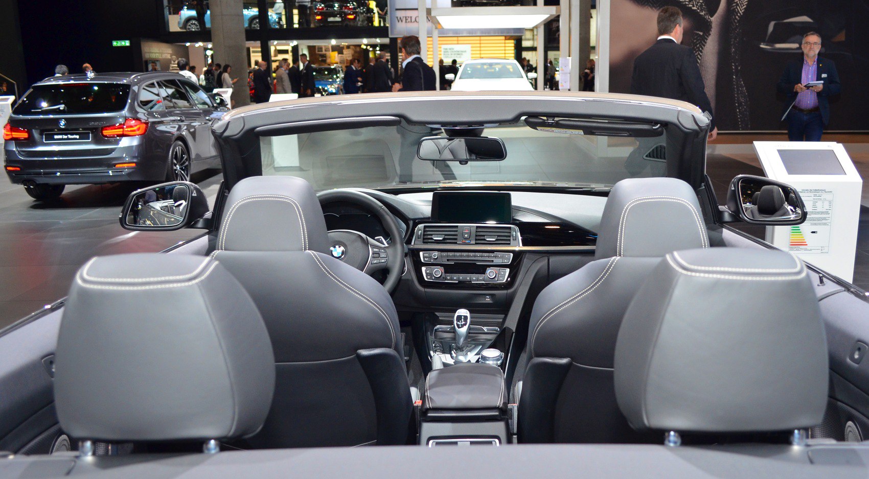 Convertible car interior with dashboard and seats