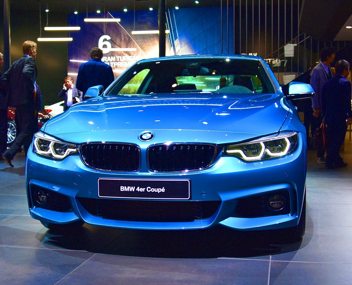 Blue BMW 4 Series Coupe front with kidney grille and LED headlights